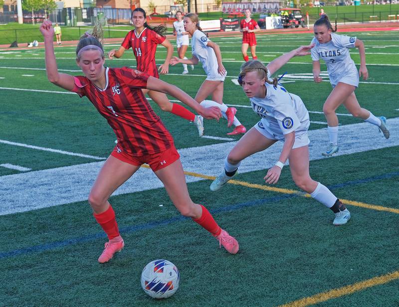 Hinsdale Central’s Avery Edgewater takes control of the ball  near the sideline during a game against Lyons Township on April 29, 2025 at Hinsdale Central High School in Hinsdale.