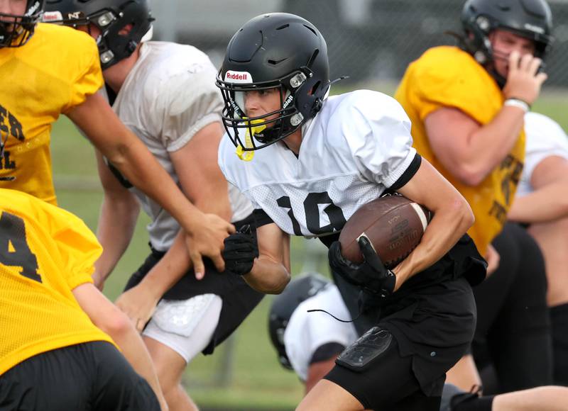 Lena-Winslow and Sycamore scrimmage Thursday, July 24, 2025, during a joint practice with Byron, Lena-Winslow and Sycamore at Sycamore High School.