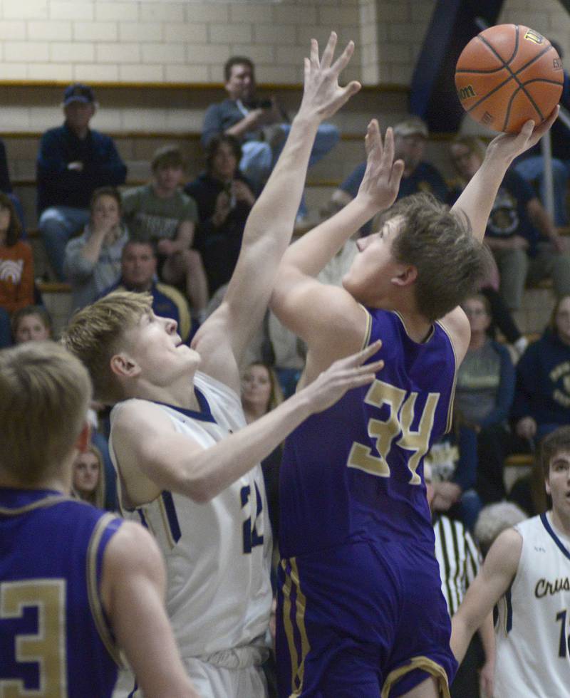 Marquette’s Alec Novotney sets to receive a pass from Charlie Mullen  during the 1st period Tuesday at Marquette.