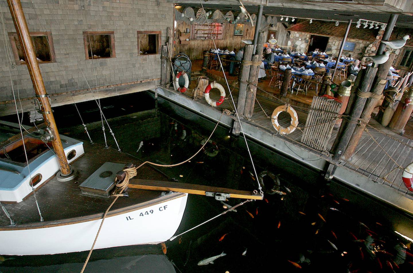 Floating in the Port Edward indoor harbor is the 25-foot sailboat, Porpoise, built in 1934 by Bond Boat Builders in Chicago.