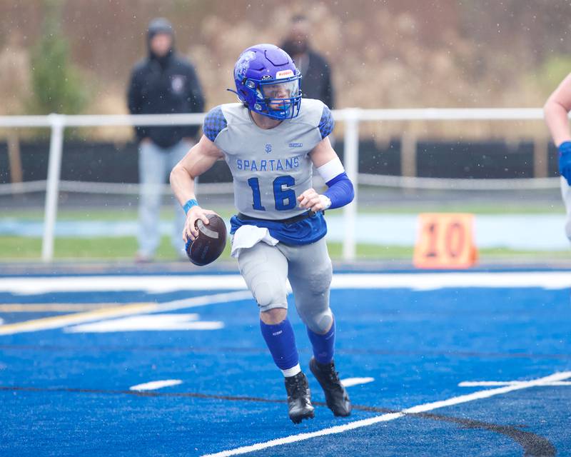 St Francis Brady Palmer looks to throw the ball against Prairie Ridge at the Class 5A second-round playoff game on Saturday Nov.9,2024 in Wheaton.