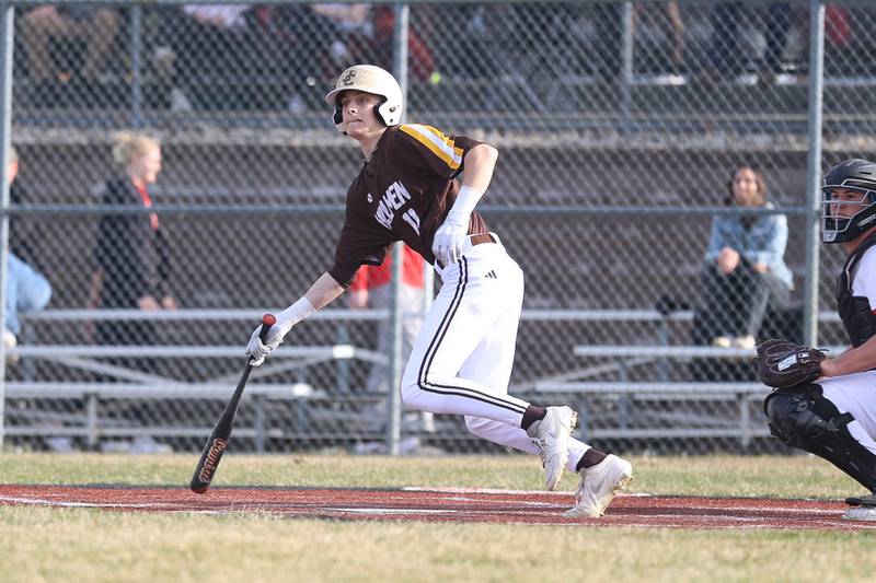 Joliet Catholic’s Koen Lynes drives in a run against Lincoln-Way Central on Wednesday, March 25, 2026 in New Lenox.