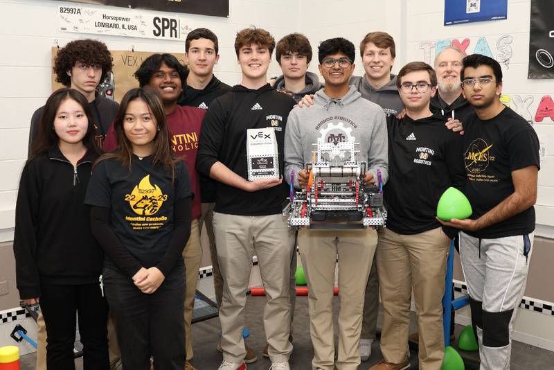 Montini Catholic's Robotics A Team, from left, front row, Seoyeon Park, Issy Jaojoco; second row, Hayden Surrette, Geethan Siram, Wyatt Prater, Anjay Dhir, Matthew Silveyra, Dhruv Patel; back row, Connor Kaefer, Damjan Pasic-Hernandez, Michael Pogorelic and Pete Farina.