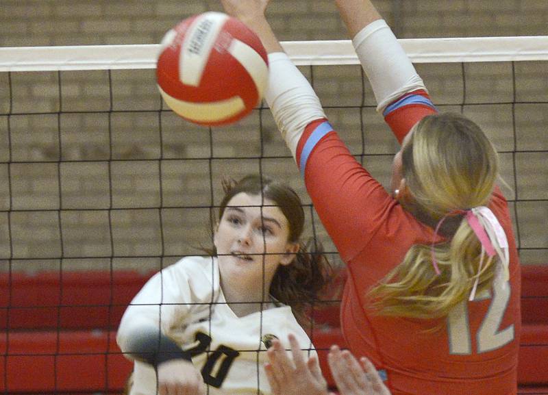 Sycamore‚Äôs Ava Wente-Argo   gets a spike past Ottawa‚Äôs Kerrigan Cooney in the 2nd set of Tuesday‚Äôs match at Ottawa.