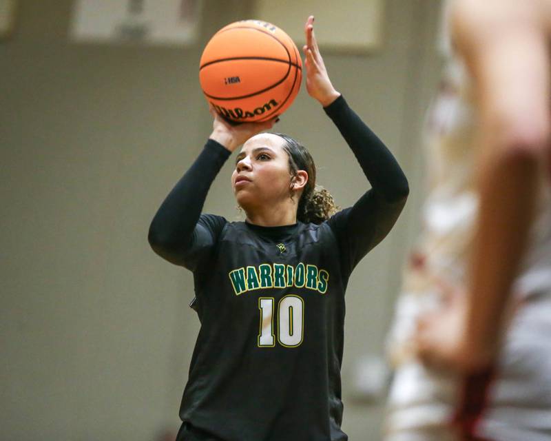 Waubonsie Valley's Danyella Mporokoso (10) shoots a free throw during their Class 4A Bolingbrook Sectional final basketball game between Waubonsie Valley at Benet. Feb 27, 2025 in Bolingbrook.