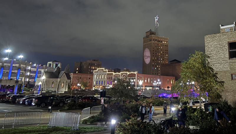 A star and installations from Lumenaura light up downtown Aurora Oct. 10, 2025. Lumenaura is described as a light and sound experience and runs through Oct. 26.