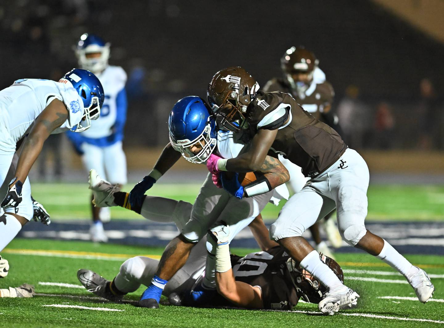 Joliet Catholic's Bryant Weston (6) tackles the Phillips running back during IHSA Class 4A first round playoff on Friday, Oct. 28, 2022, at Joliet. (Dean Reid for Shaw Media)