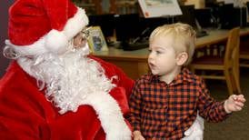 PHOTO: Santa pays a visit to Yorkville for 'Polar Express' day