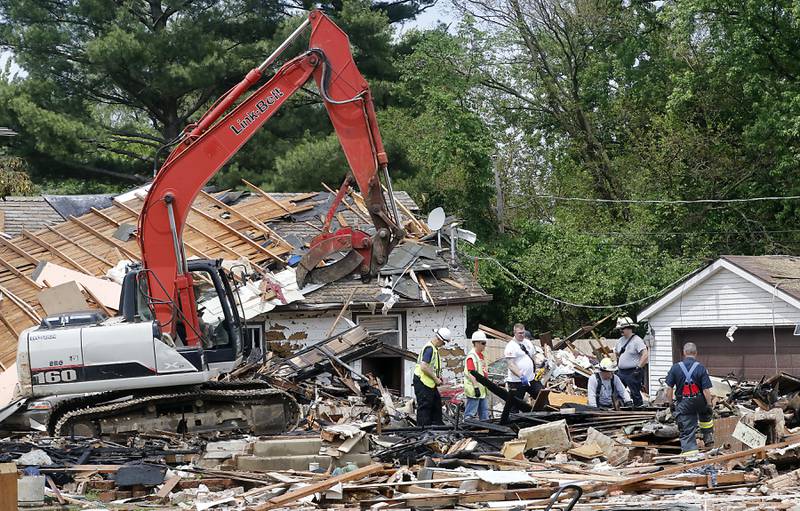 Authorities look for the cause of a home explosion on Monday, May 18, 2026, in 7400 block of Birch Drive, in Wonder Lake, after the Sunday evening explosion. One resident of a home was killed and two others have been taken to the hospital.