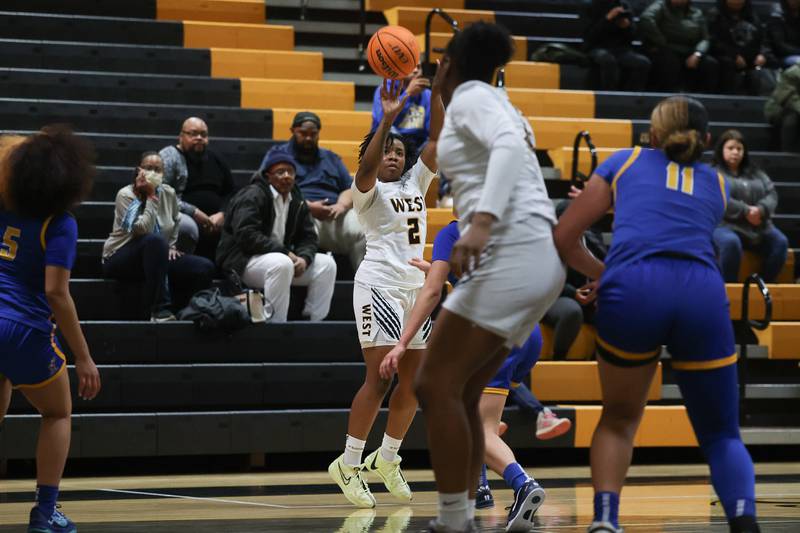 Joliet West’s Khiana Tyler takes the outside shot against Joliet Central on Thursday, Jan 30, 2025 in Joliet.
