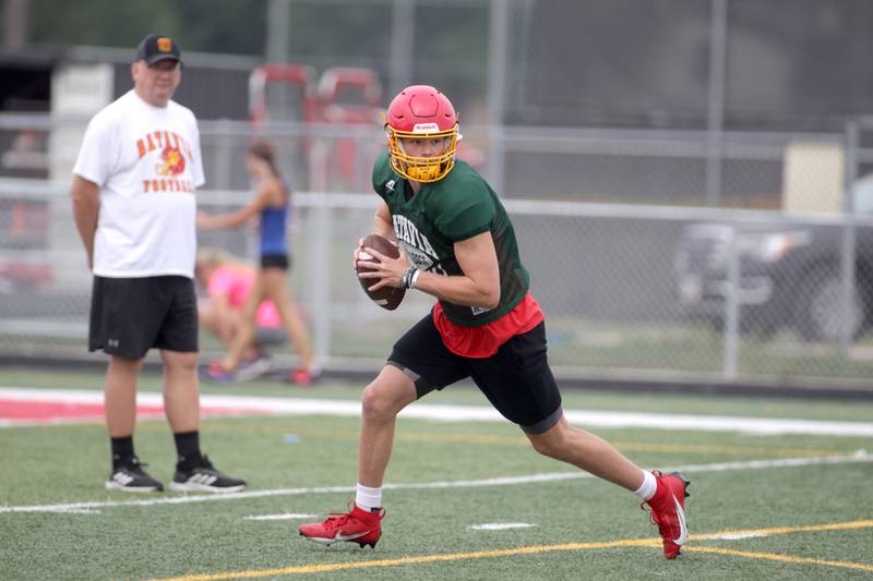Batavia quarterback Ryan Boe looks to throw the ball during practice at the school on Thursday, Aug. 10, 2023.