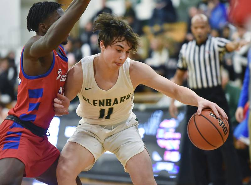 John Starks/jstarks@dailyherald.com
Glenbard South’s Jalen Brown tries to slow down Glenbard West’s Logan Brown in a boys basketball game in Glen Ellyn on Monday, November 21, 2022.