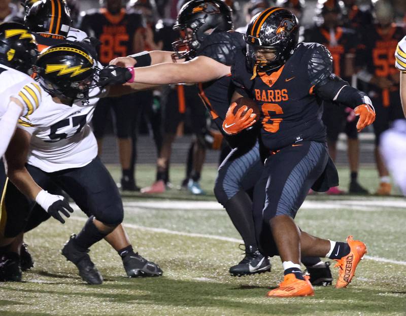 DeKalb's Travis Moore looks to get by Andrew’s Judah Van Engen during their game Friday, Oct. 16, 2025, at DeKalb High School.