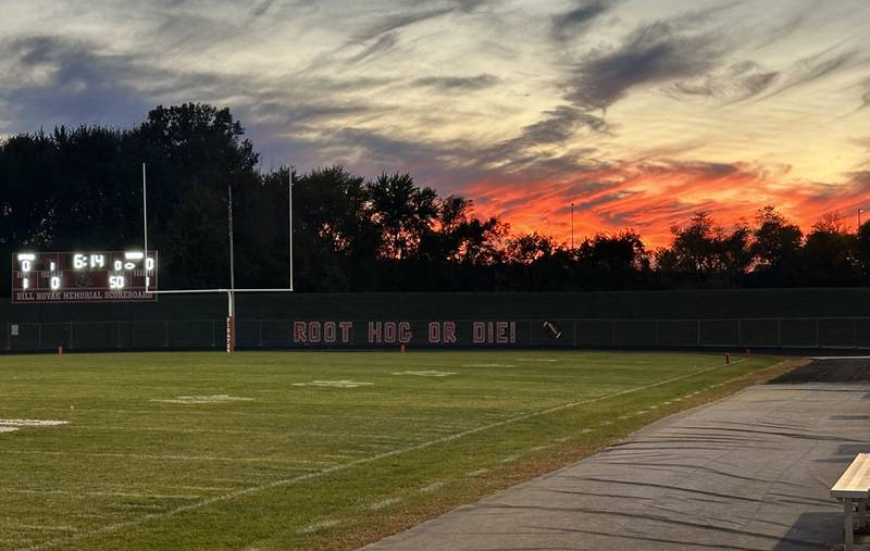 The sun sets over King Field on Friday, Oct. 24, 2025 at Ottawa High School.