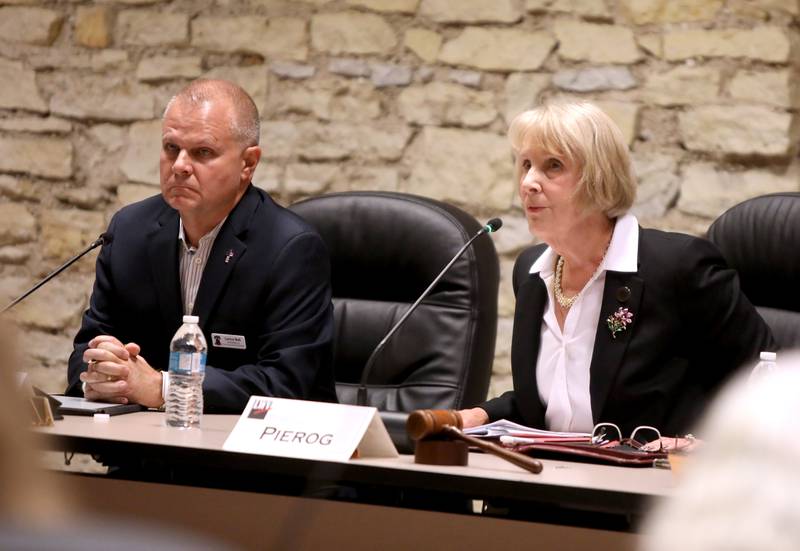 Corinne Pierog (right), incumbent candidate for Kane County Board Chairman, answers a question as candidate Lance Bell (left) looks on during a candidate forum for the 2024 General Election hosted by the League of Women Voters of Central Kane County on Monday, Sept. 30, 2024 at Batavia City Hall.