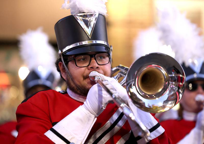 A member of the Northern Illinois University marching band plays in downtown DeKalb Thursday, Oct. 17, 2024, during the Huskie Homecoming Block Party.