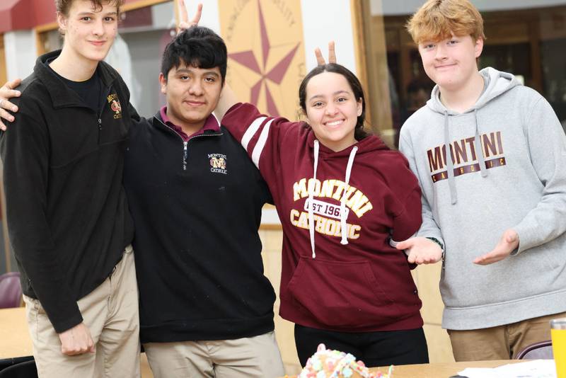 The winning Gingerbread House Wars team at Montini Catholic included, from left,  junior Henry Dawson, freshman Vincent Salgado, freshman Sophia Stiso and freshman Michael Breier.