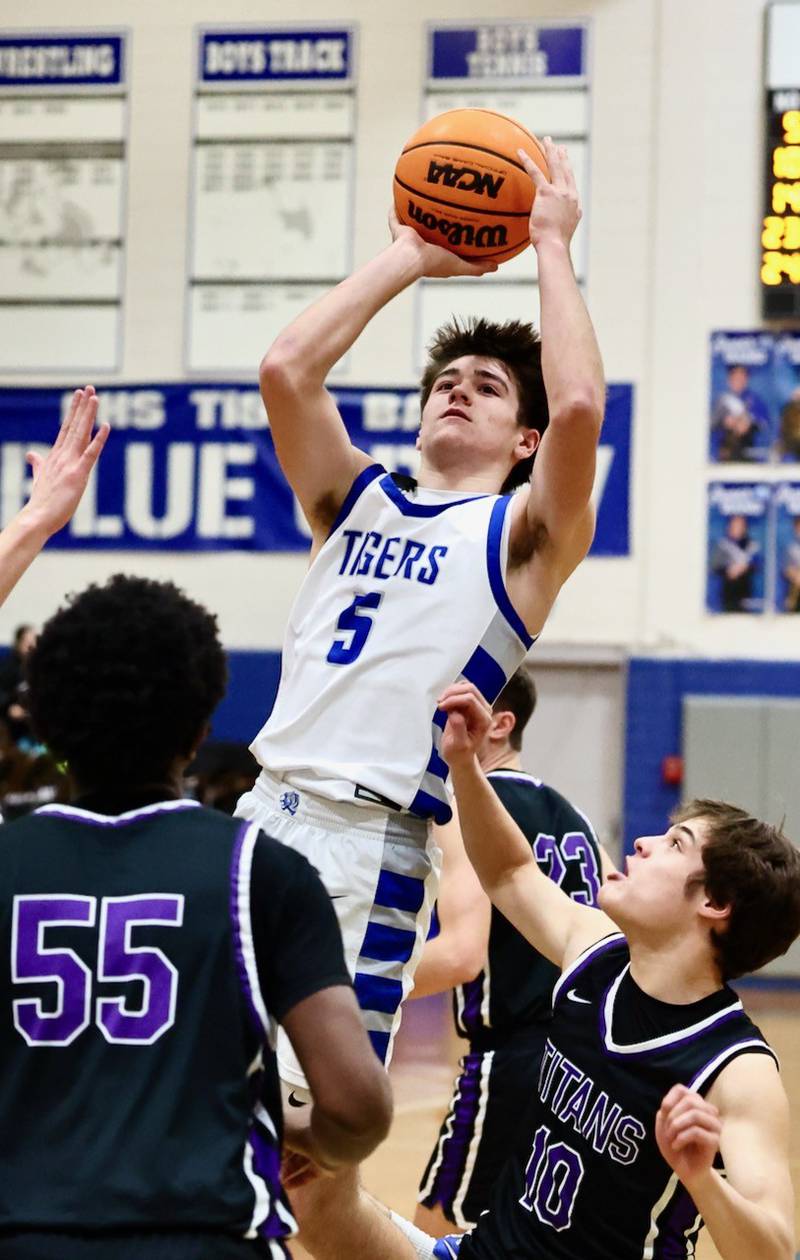 Princeton's  Jack Oester shoots against El Paso-Gridley Tuesday night at Prouty Gym. The Titans defeated the Tigers 75-59.