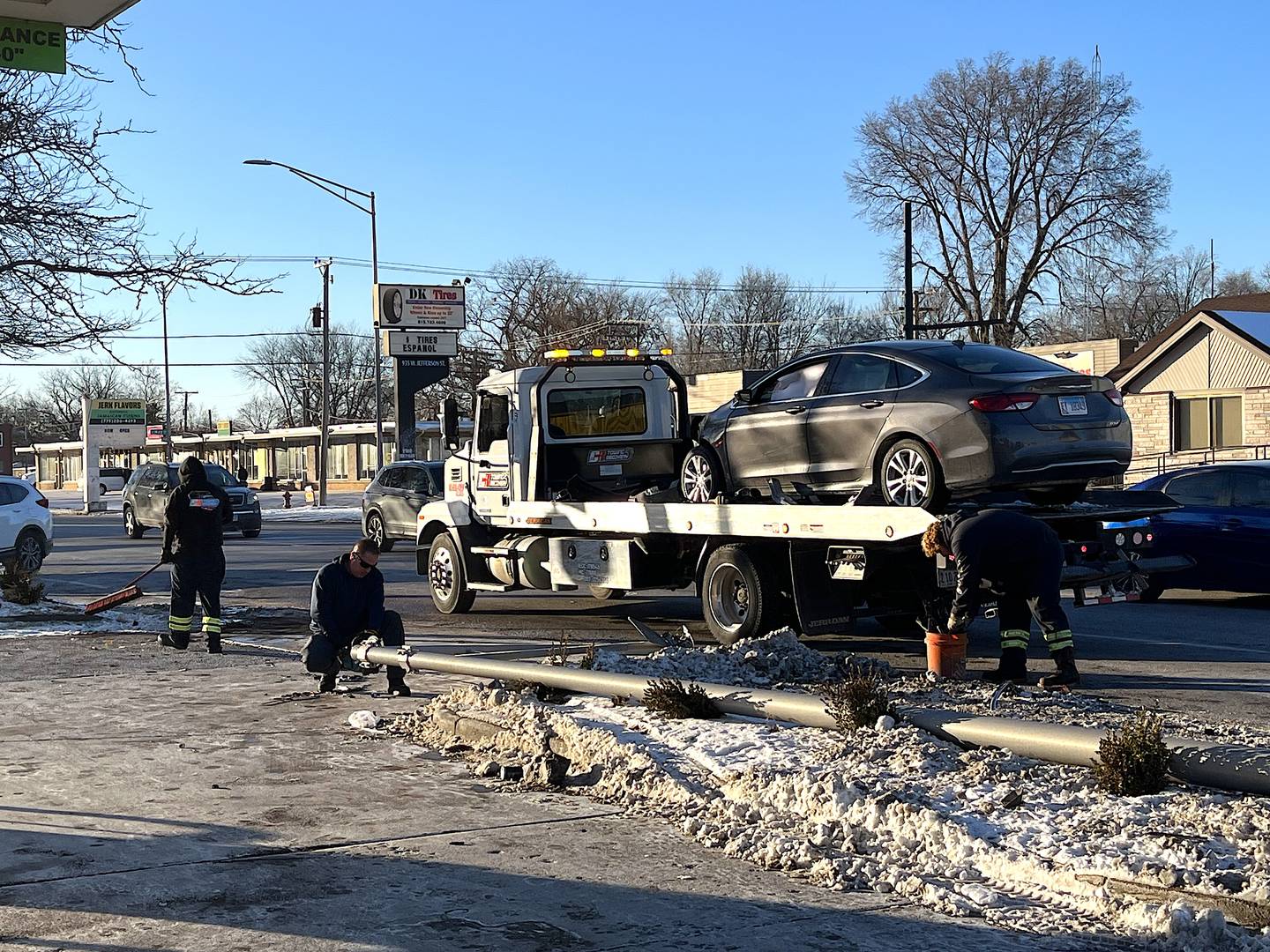 The aftermath of a three-vehicle crash on Thursday, Jan. 29, 2026, on West Jefferson Street, in Joliet, that led to a city light pole to get knocked down onto a roadway.