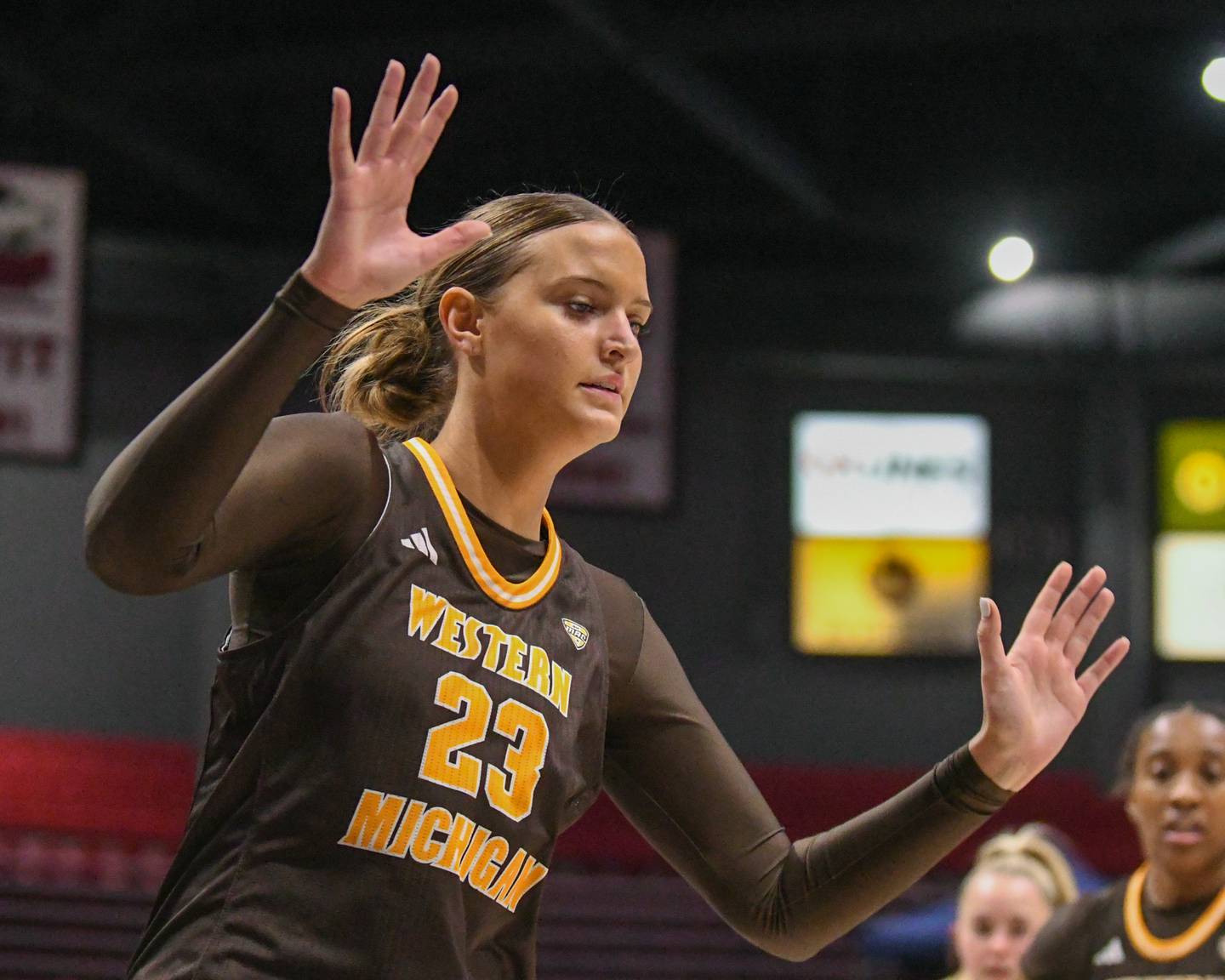 western Michigan University's Eveyn Carrier (23) plays defense while traveling to take on Northern Illinois University's Laura Nickel (32) during the game on Saturday Jan. 11, 2025, held at the Convocation center in DeKalb.
