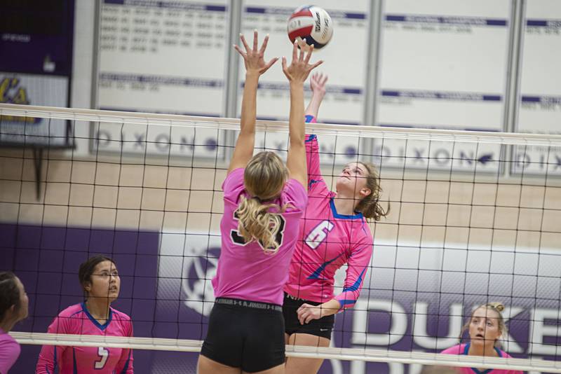 Genoa-Kingston’s Kaitlin Rahn works the net against Dixon Thursday, Oct. 6, 2022.