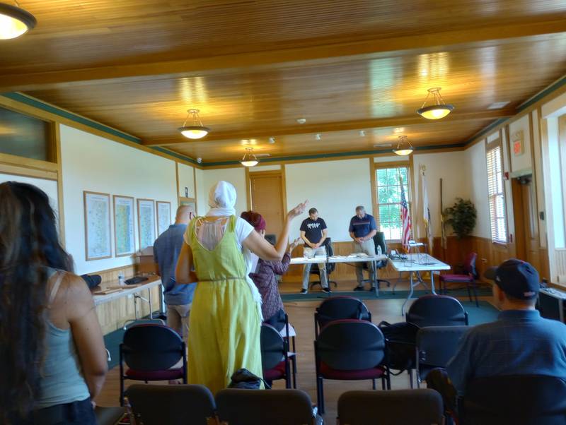 Jon Zaghloul (left) and Eric Birkholz lead a worship service for a new church, Philadelphia Assemblies Fox Valley, Saturday, Aug. 3 at the Campton Township Community Center in Campton Hills.