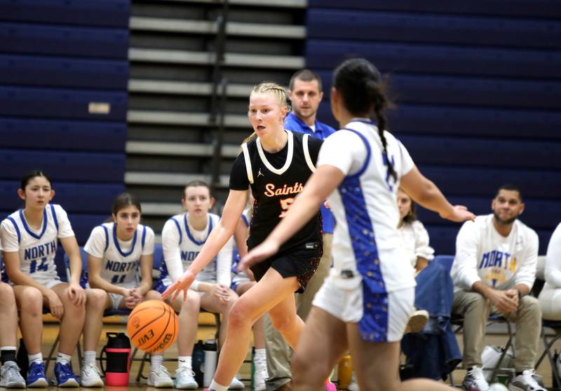 St. Charles East’s Brooklyn Schilb drives toward the basket during a game on Tuesday, Dec. 10, 2024 against Wheaton North in Wheaton.