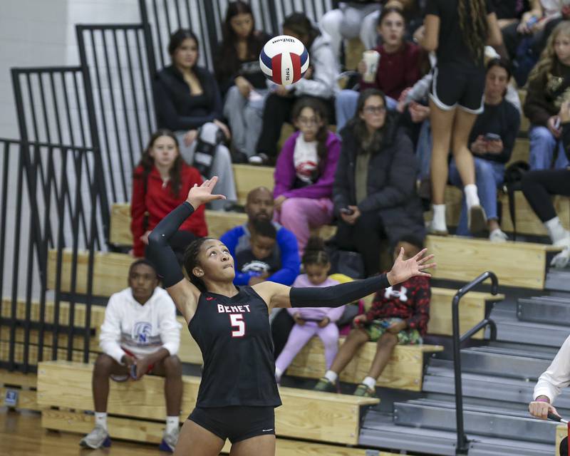 Benet's Brooklynne Brass (5) serves during Class 4A Glenbard West Sectional final volleyball match between St Charles North at Benet. Nov 6, 2025 in Glen Ellyn.