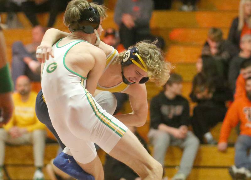 Sterling's Zyan Westbrook wrestles Geneseo's Devan Hornback in the 132 weight class during the Class 2A Sectional championship on Saturday, Feb. 15, 2025 at Washington High School.