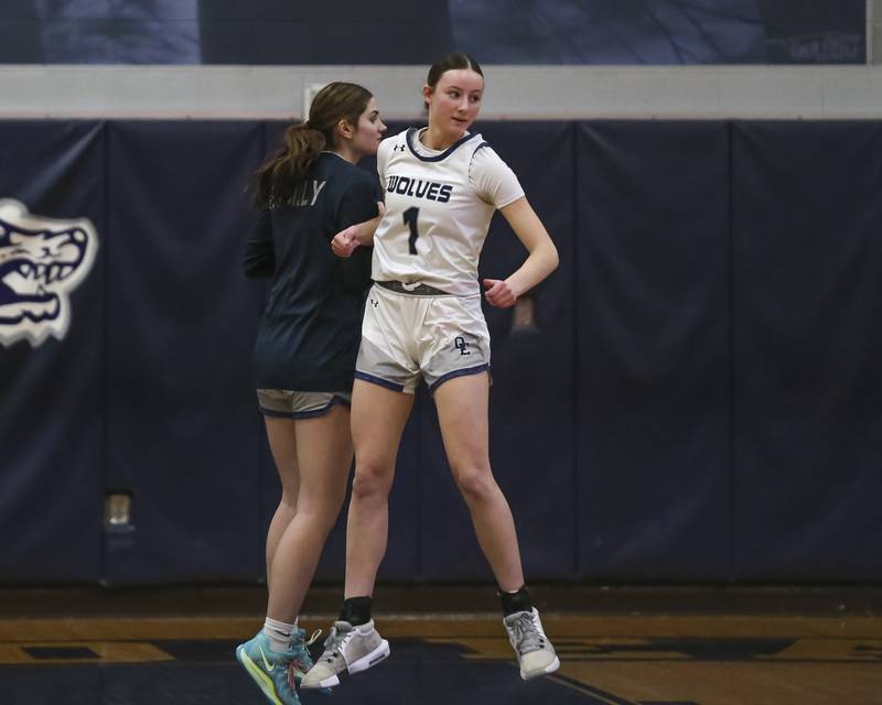 Oswego East's Aubrey Lamberti (1) is introduced during pregame introductions before their basketball game between Minooka at Oswego East Friday, Jan 16, 2026 in Oswego.