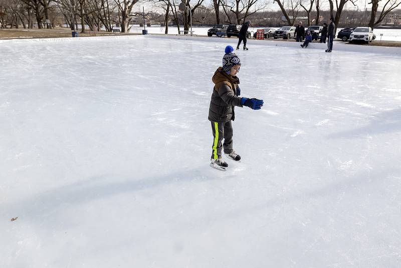 Wade Fiessinger, 7, takes advantage of the ice and mild temps Saturday, Jan. 11, 2025, to try out the ice rink in Dixon.