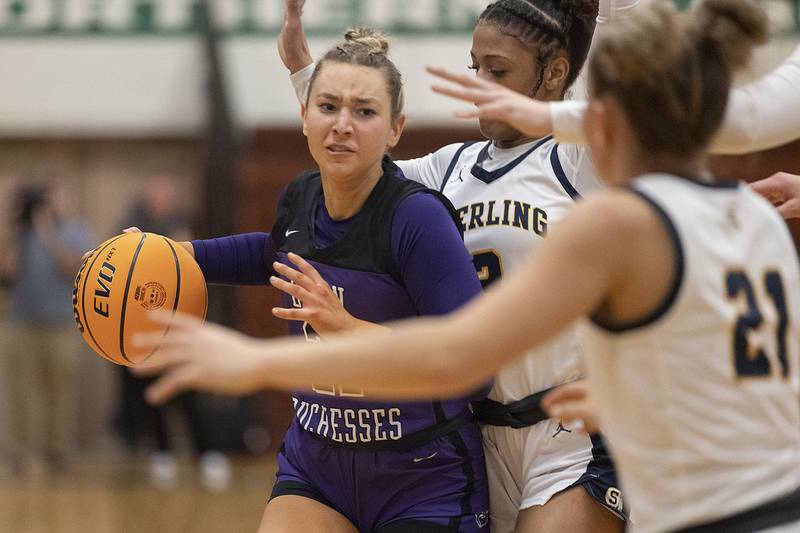 Dixon's Reese Dambman handles the ball against Sterling Thursday, Feb. 27, 2025, during the Class 3A girls Sectional title at Rockford Boylan High School.