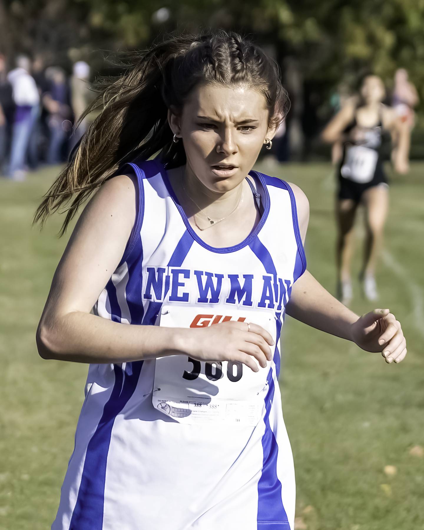 Newman's Claire Crisham competes in the 1A Rock Falls Regional cross country race Saturday morning at Centennial Park.