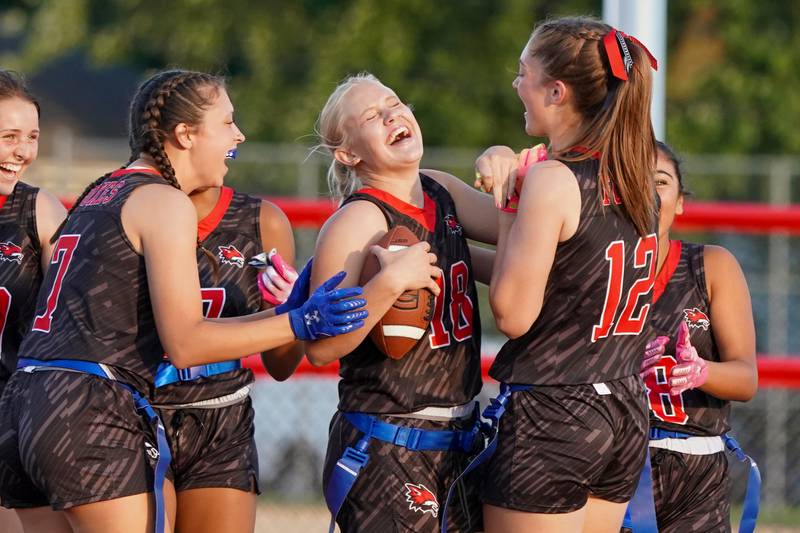 Yorkville's Brooke Ekwinski (18) smiles after scoring a touchdown against Geneva during a non-conference game at Yorkville High School on Tuesday, Sept. 2, 2025.