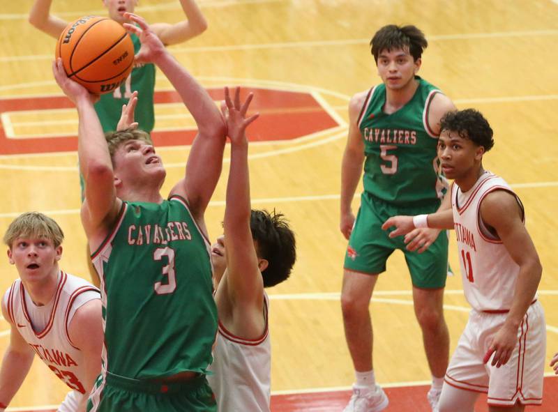 L-P's Braylin Bond drives to the hoop to score a layup against Ottawa on Friday, Feb. 6, 2026 in Kingman Gymnasium at Ottawa High School.