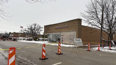 Roof of downtown Woodstock business collapses, road shut down amid concerns of further damage
