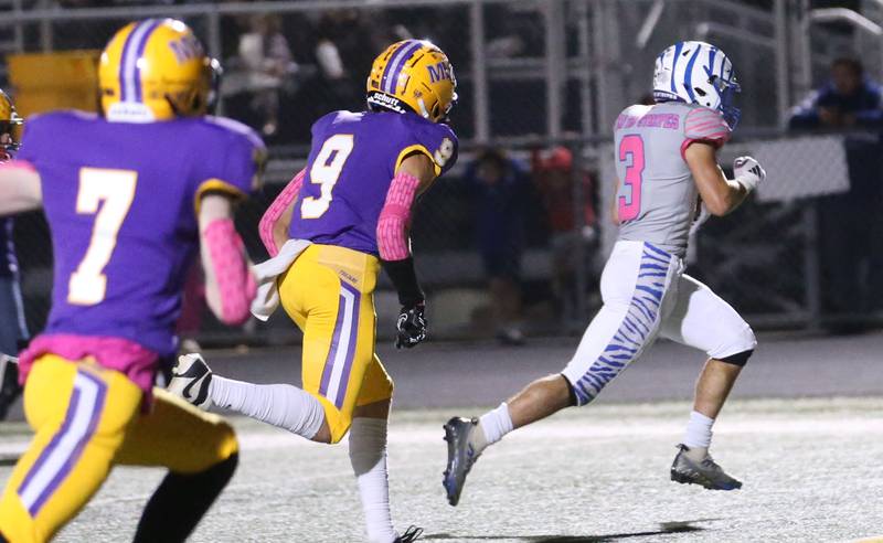 Princeton's Ace Christiansen runs for a touchdown past Mendota's Gavin Evans and teammate Brennan Northcutt on Friday, Oct. 11, 2024 at Mendota High School.