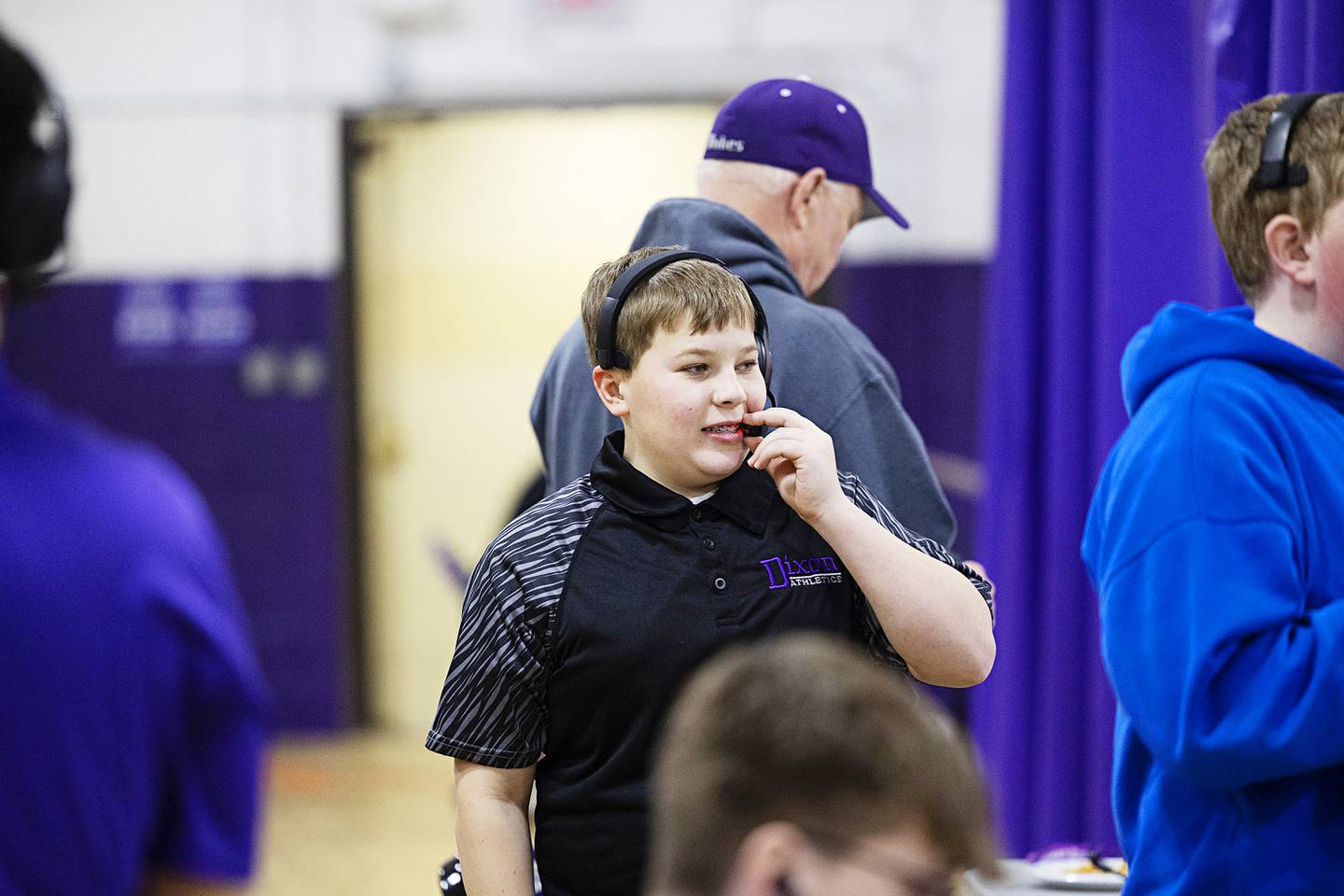 Dixon High School Broadcasting Club member Cade Kirchhoff works Thursday, Feb. 19, 2026, at the Class 3A girls basketball regional title game.