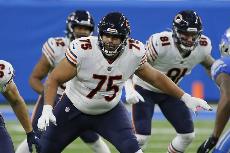 Chicago Bears offensive tackle Larry Borom blocks against the Detroit Lions, Thursday, Nov. 25, 2021, in Detroit.