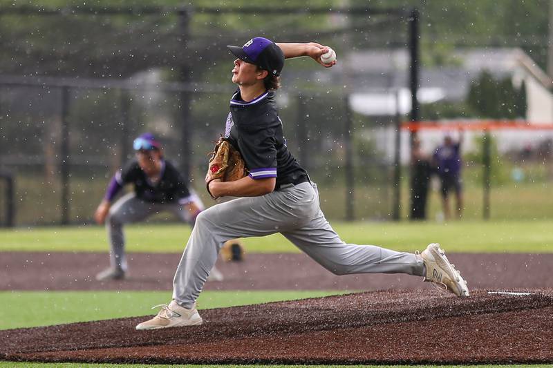 Downers Grove North's Ryan Dennison (5) delivers a pitch during Class 4A Romeoville Sectional semifinal between Oswego East at Downers Grove North.  May 31, 2023.