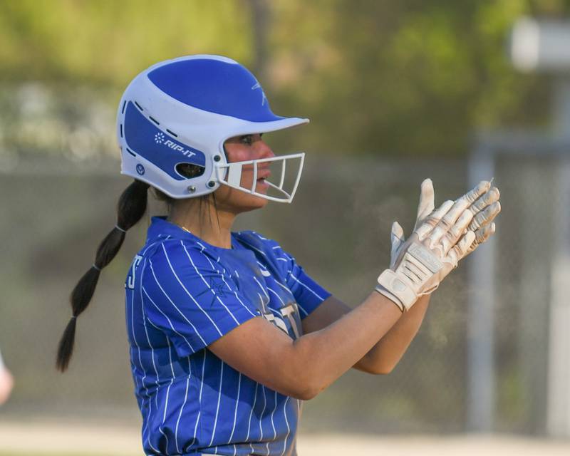 St. Charles North's Maddie Hernandez (2) celebrates after getting a triple while traveling to take on Lake Park High School on Wednesday April 24, 2024.