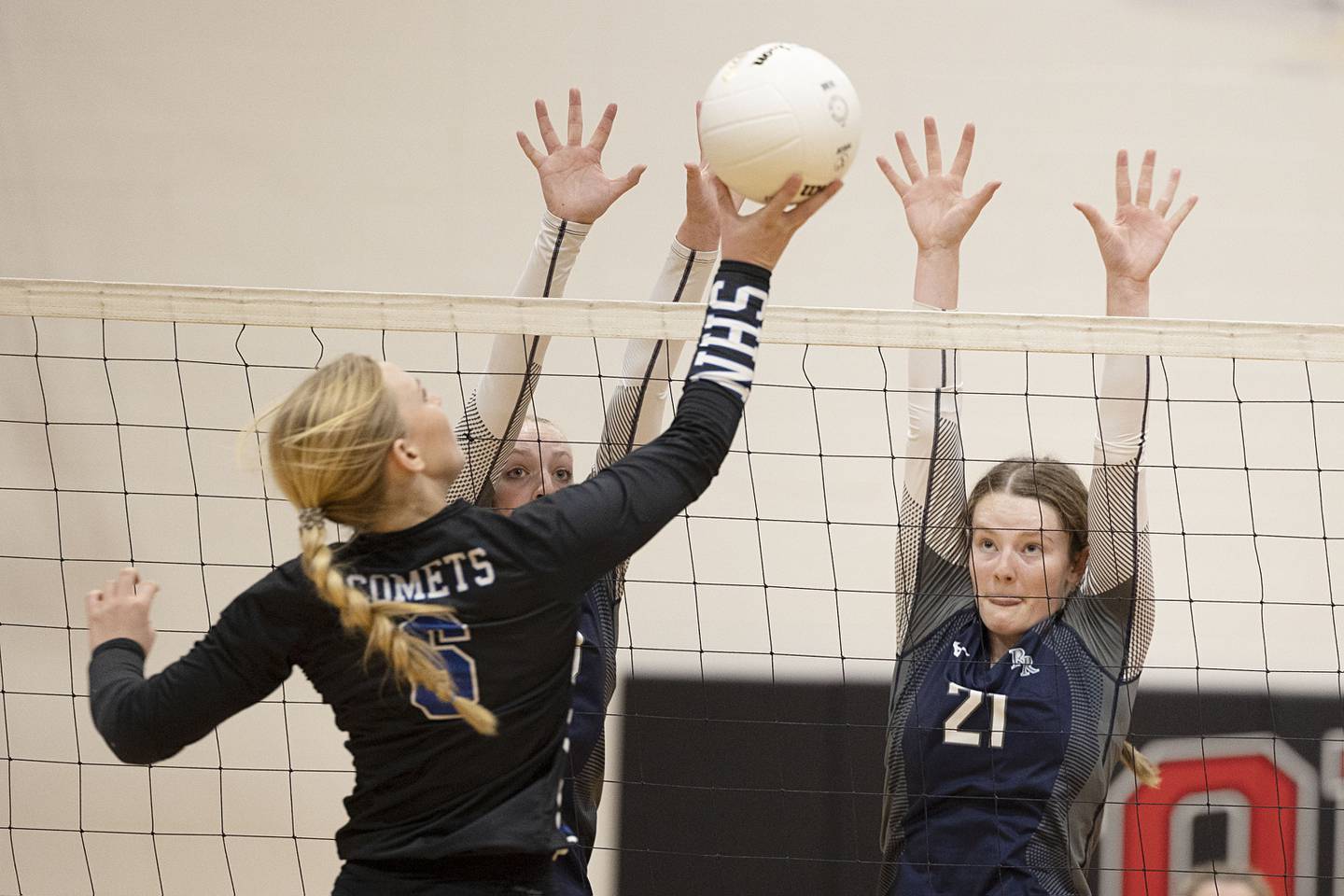 River Ridge’s Sadie Fry (right) goes up to block a shot by Newman’s Jess Johns Wednesday, Nov. 2, 2022 in the sectional championship game.