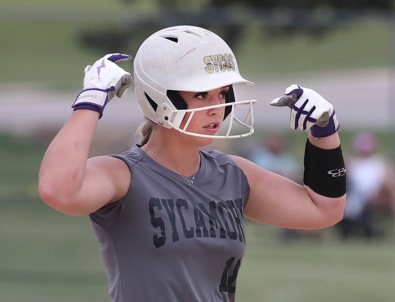 Sycos’ Kennedy Latimer celebrates after hitting an RBI double Friday, June 27, 2025, during their 16u game against Select Fastpitch in the Storm Days tournament at the Sycamore Community Sports Complex.