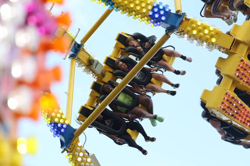 Festival goers brave one of the carnival rides on day 2 of the Taste of Joliet. Saturday, June 25, 2022 in Joliet.