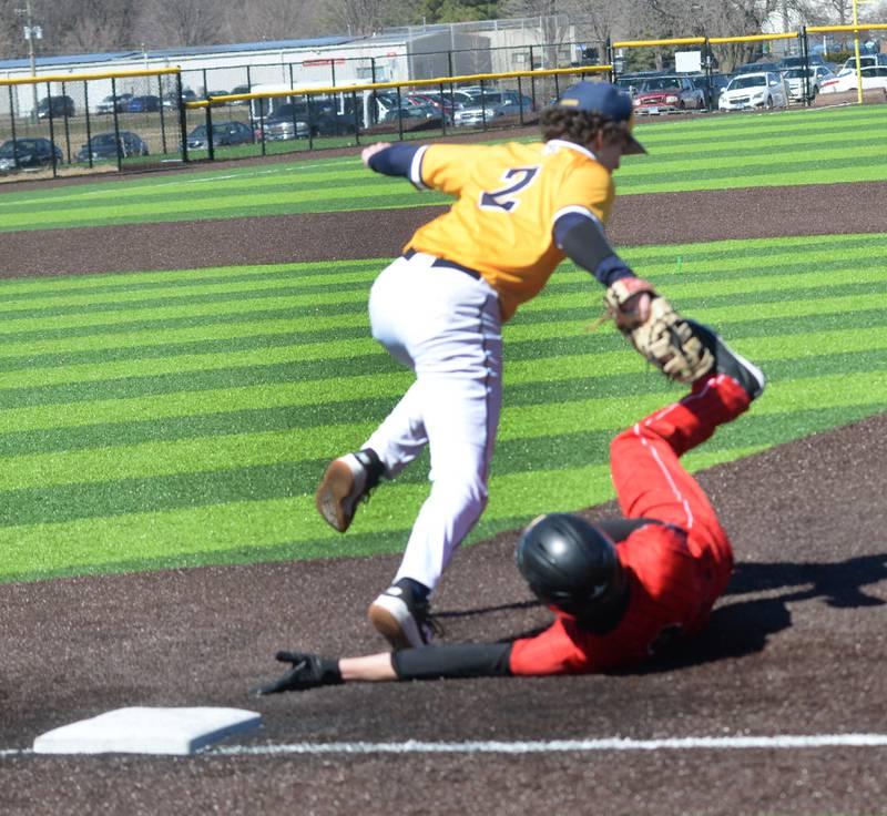 Sterling's Adrian Monarrez tags out Erie-Prophetstown's Alastaire Sweetser on hia foot as he tries to dive back to first on Saturday, March 22, 2025 at Gartner Park in Sterling.