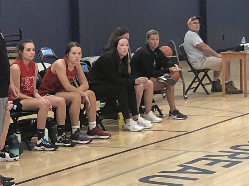 For Bureau Valley standout and coach Saige Barnett sits on the bench for Erie-Prophetstown Thursday night at Storm Gym. She is coaching the E-P freshmen this year.