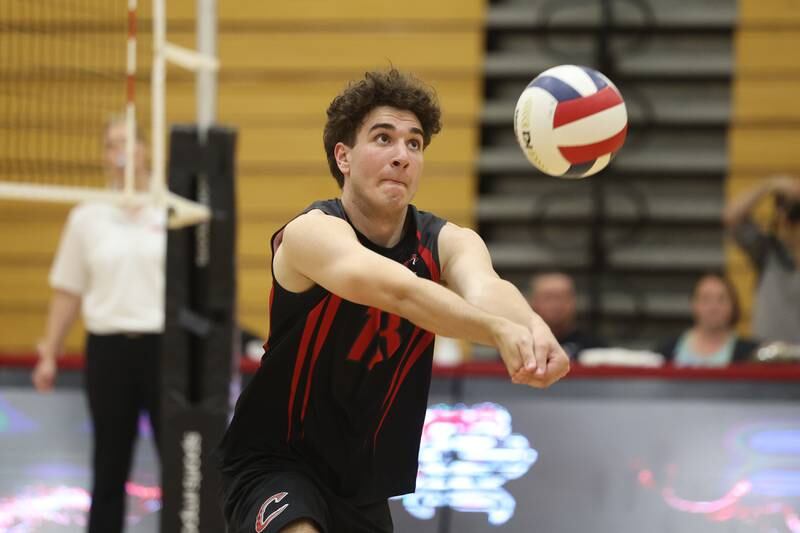 Lincoln-Way Central’s Joey Babich keeps the volley going against Bolingbrook on Tuesday May 7, 2024 in New Lenox.