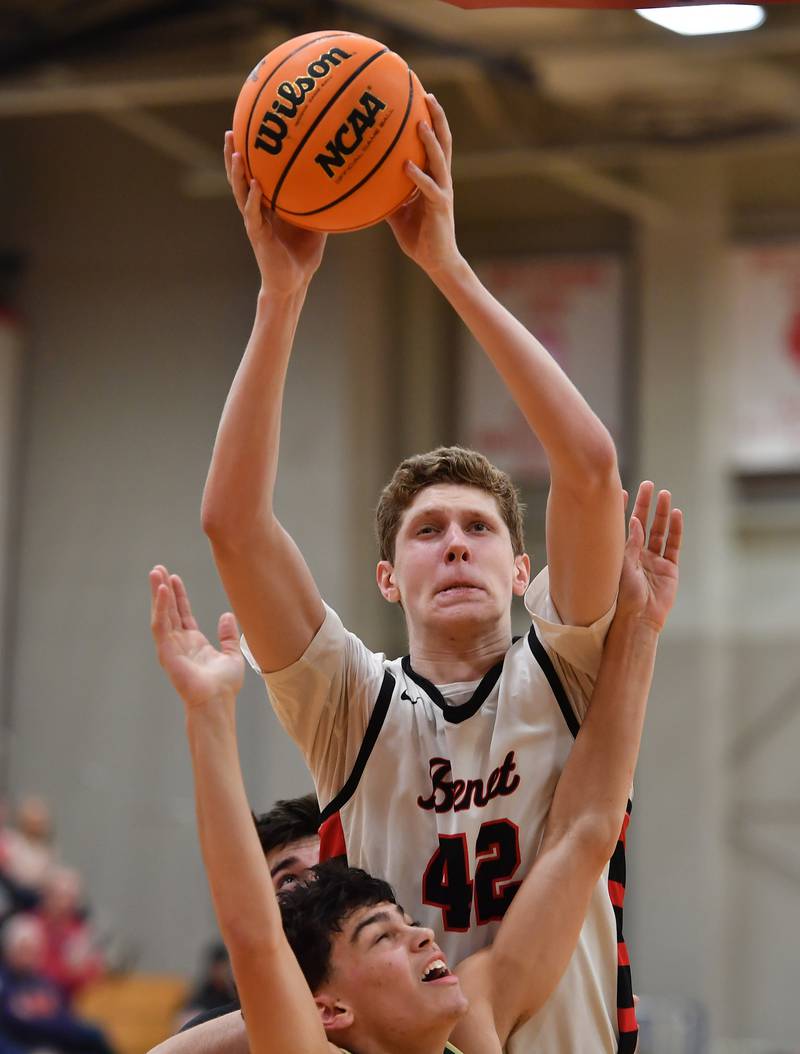 Benet’s  Colin Stack (42) grabs a rebound during a game against St. Patrick on January 17, 2025 at Benet Academy in Lisle.