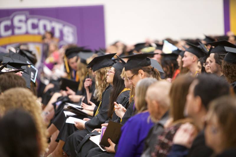 New graduates sit after receiving their degrees at commencement at McHenry County College on Saturday, May 11, 2024, in Crystal Lake.