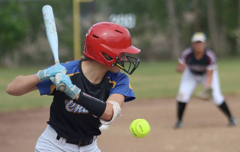 Aurora Central Catholic’s Grace Grunloh takes an inside pitch against Marengo in varsity girls softball IHSA Class 2A Regional Title Game action on Friday, May 22, 2026 at Raymond Benoy Field on the campus of Marian Central High School in Woodstock.
